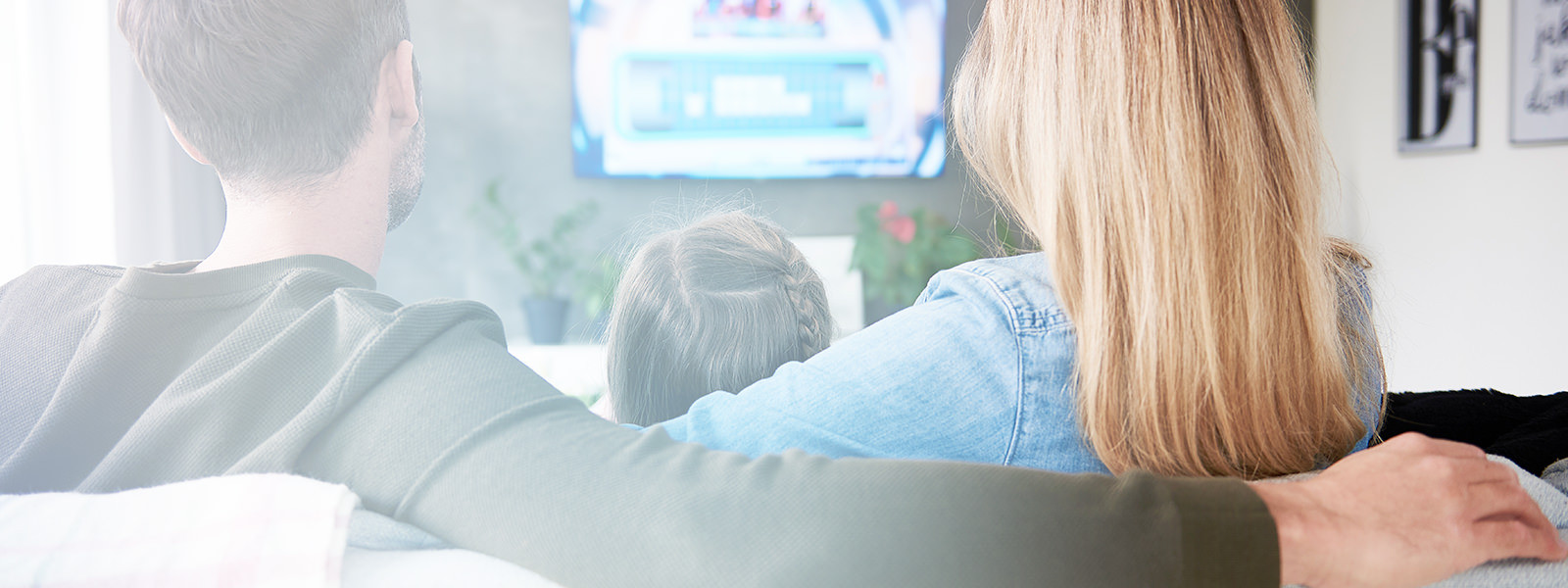 Family watching TV