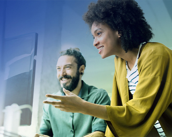 A men and women happily working on system.
