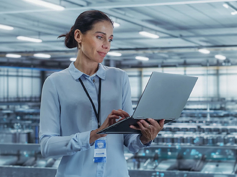 Associate looking at laptop