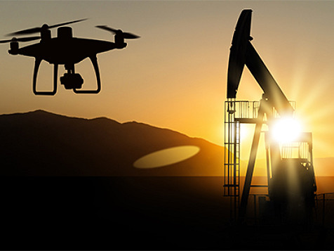 Un dron volando sobre una plataforma petrolera