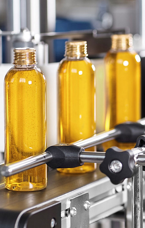 Bottles on a conveyor belt under production