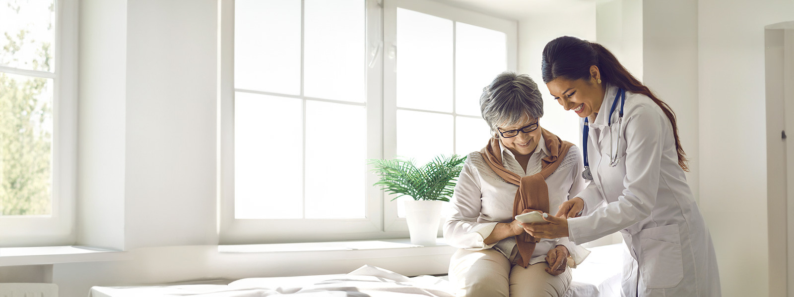 Two women looking at mobile