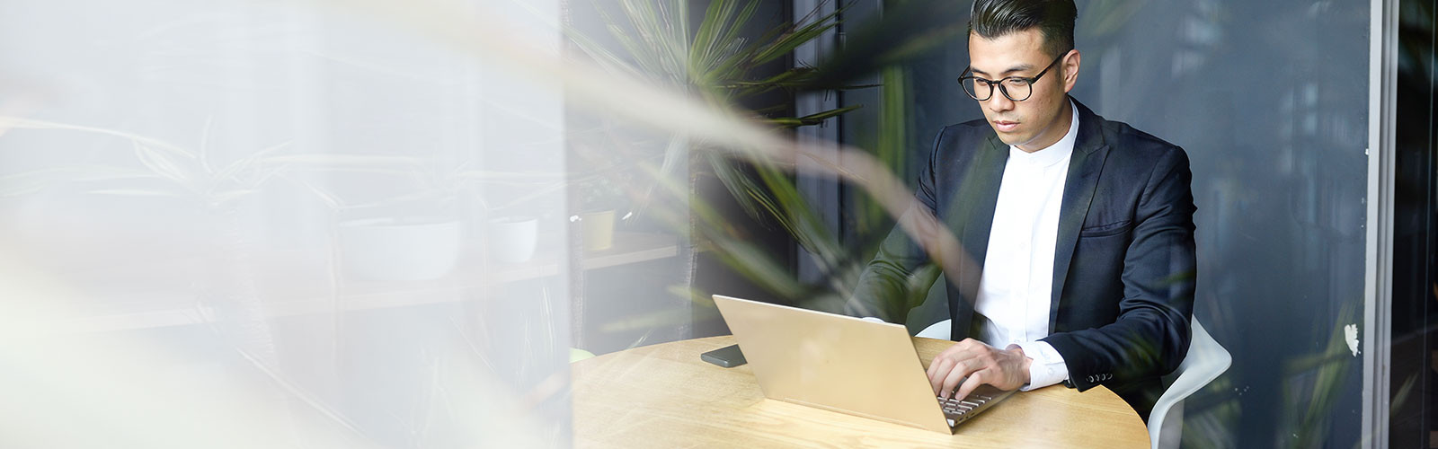 professional working on his laptop