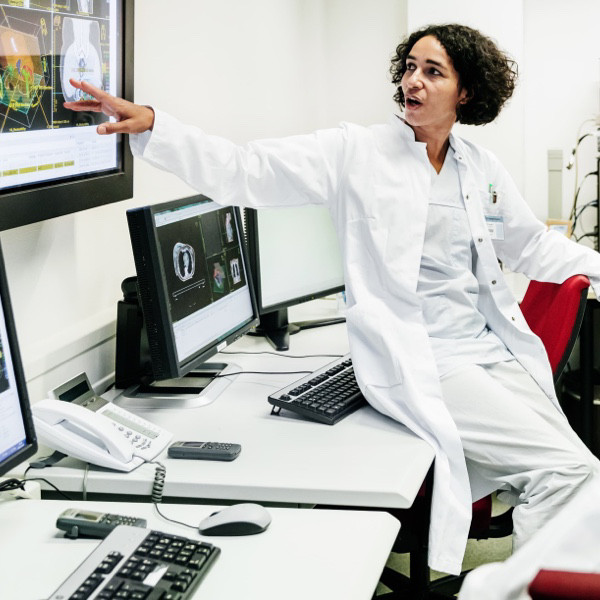 doctor pointing at a monitor