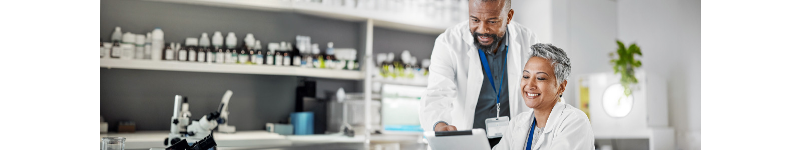 A woman and man working in a laboratory