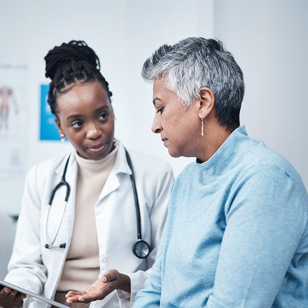 Doctor speaking with a patient