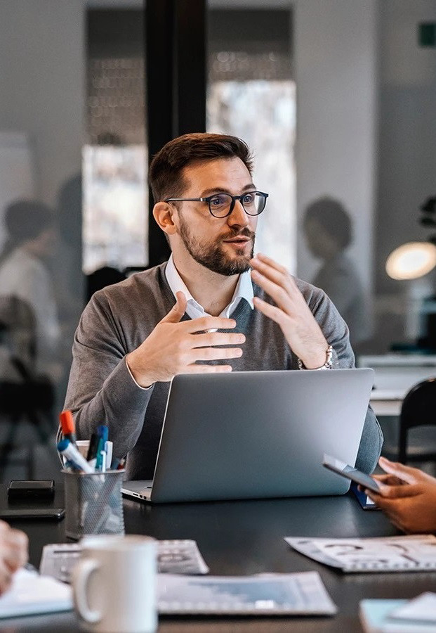 Colleagues discussing in office