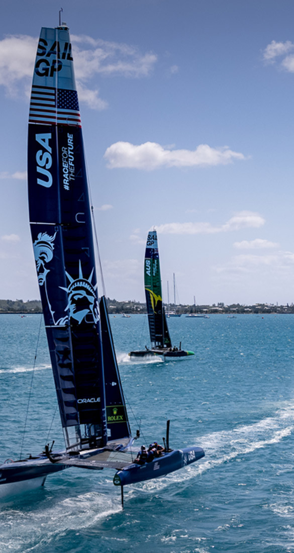 Sailboats moving in ocean water