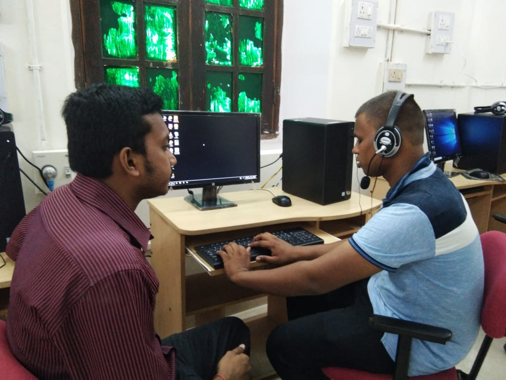 Visually impaired student learning computer