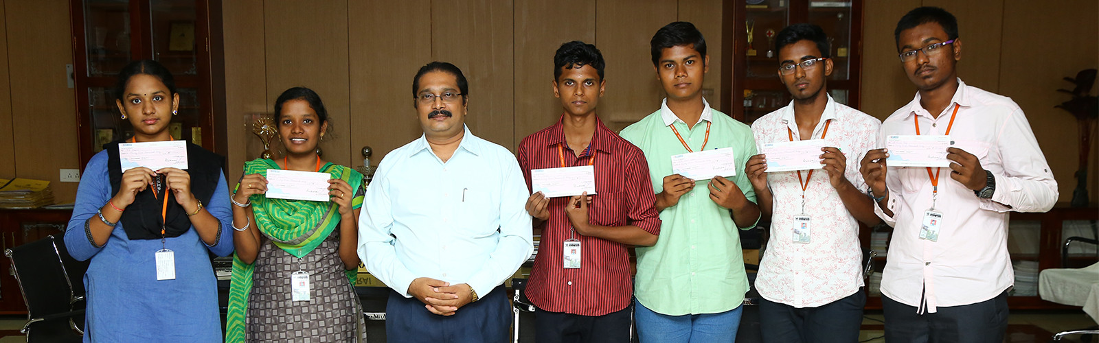 Students with their scholarship cheque