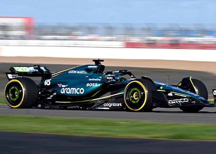 A formula one car racing through a track