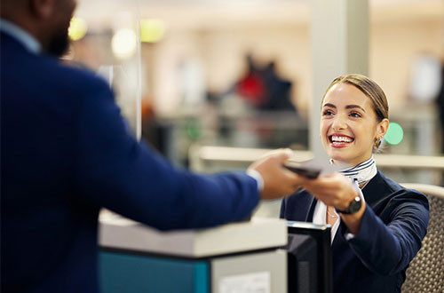 Service agent with passport in airport