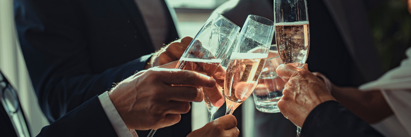 Business people making a toast at an office party; Shutterstock ID 1992912713; purchase_order: 1000046245; job: Nordics FM ; client: Sweden ; other: yes 