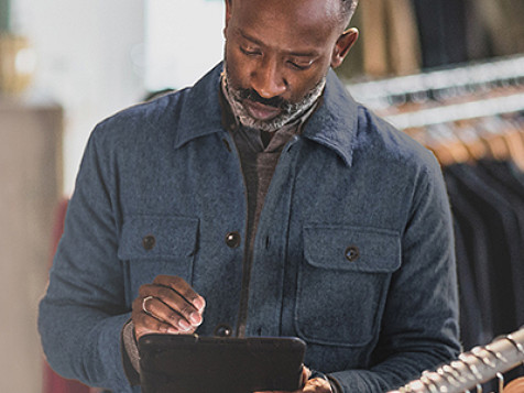 Man looking at a tablet