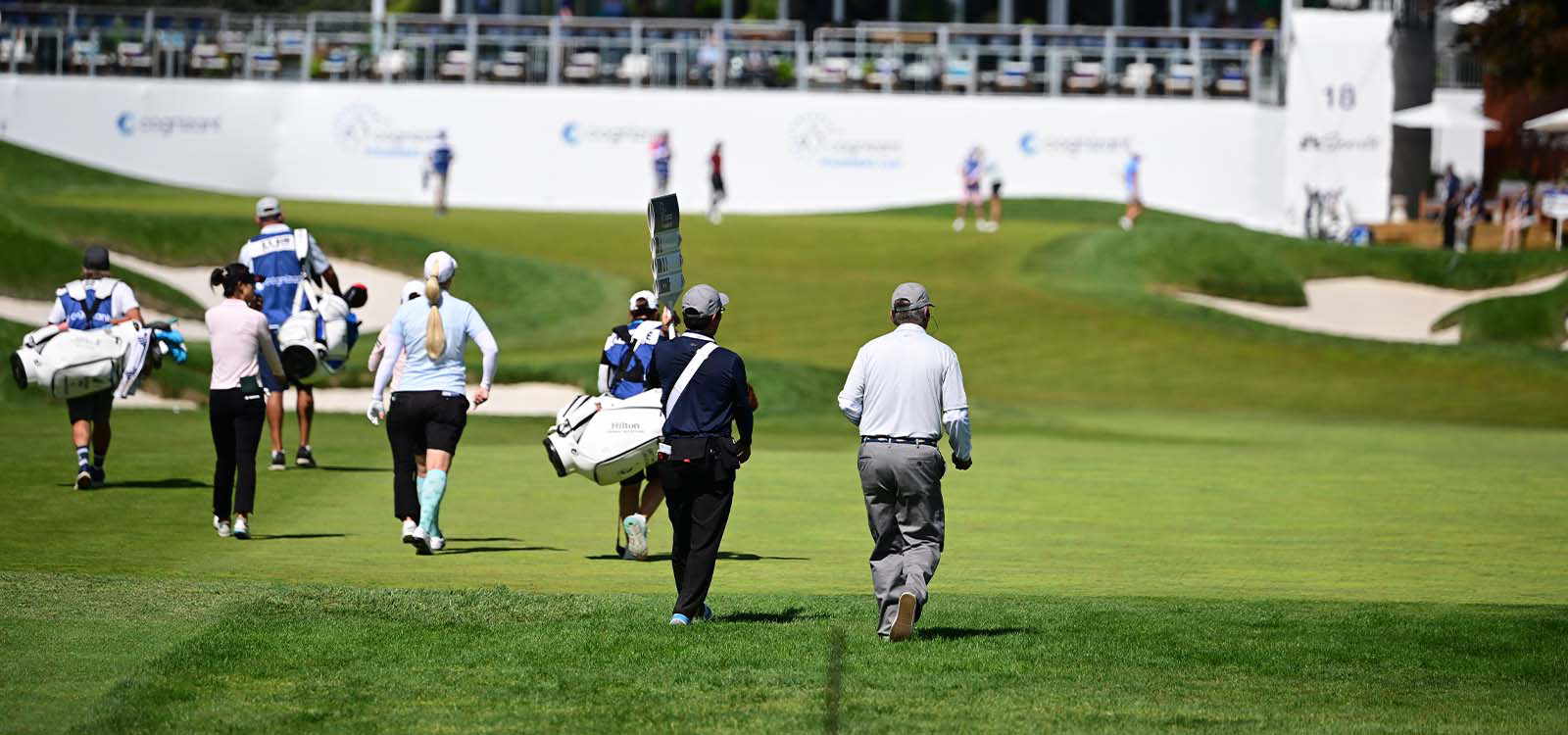 jugadores en el campo de golf