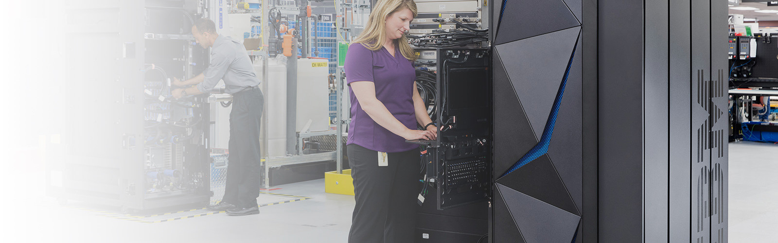Woman working on IBM server