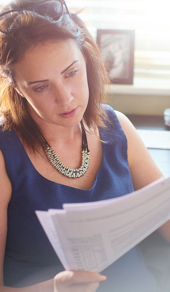 Female looking at document papers