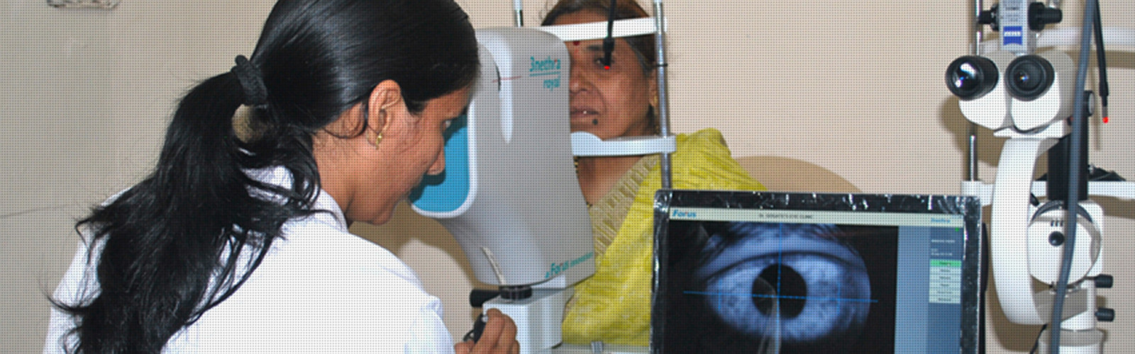 Doctor is checking the eye sight for patient