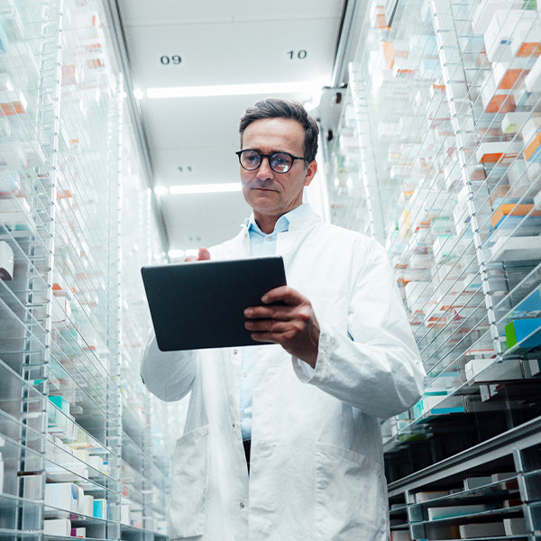 pharmacist with tablet