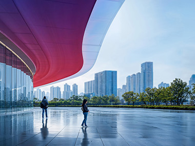 A modern building with curved glass architecture