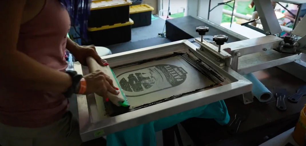 A team standing on a stage at an event