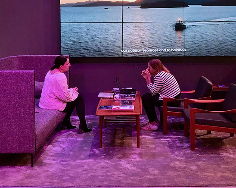 Two ladies in discussion
