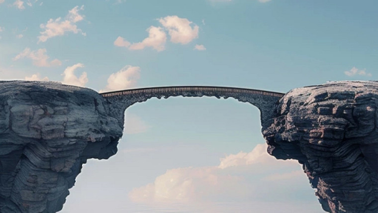 A stone bridge between two mountains
