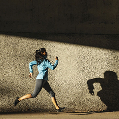 girl running in the dark