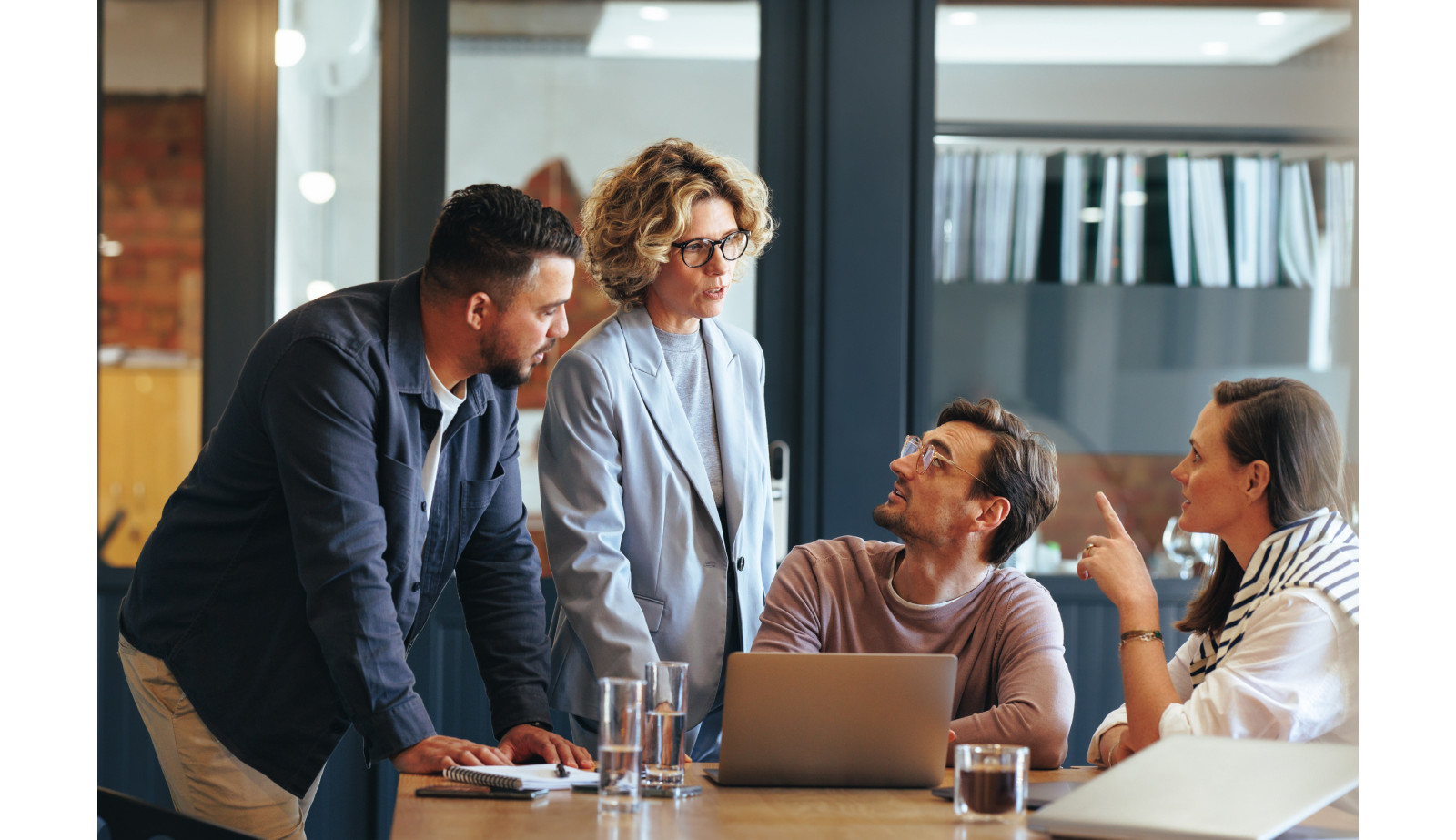 employees interacting over technology