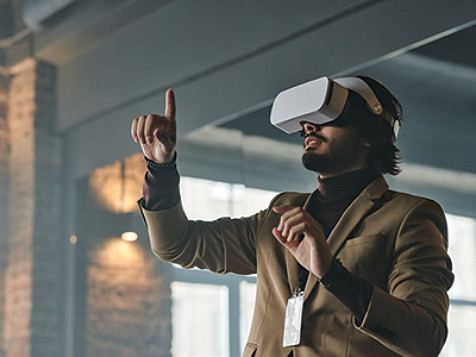 A man wearing virtual reality glasses