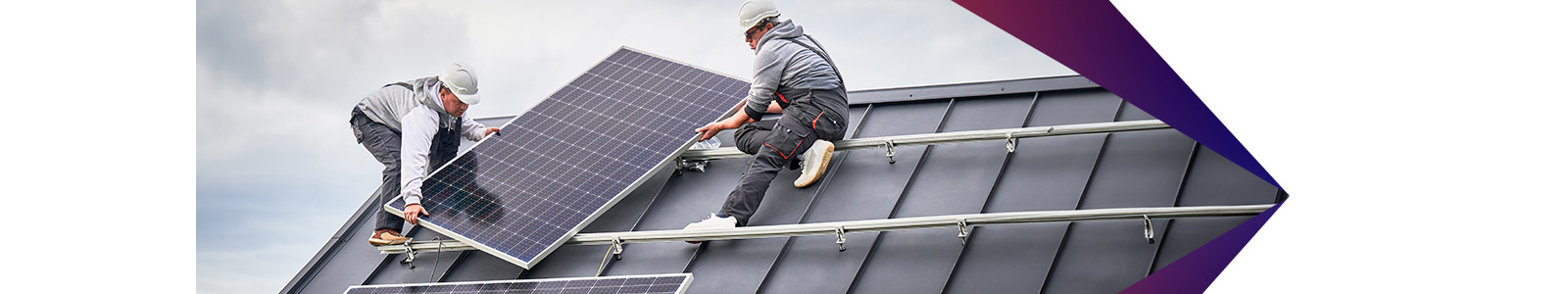 Two person fixing solar pannel